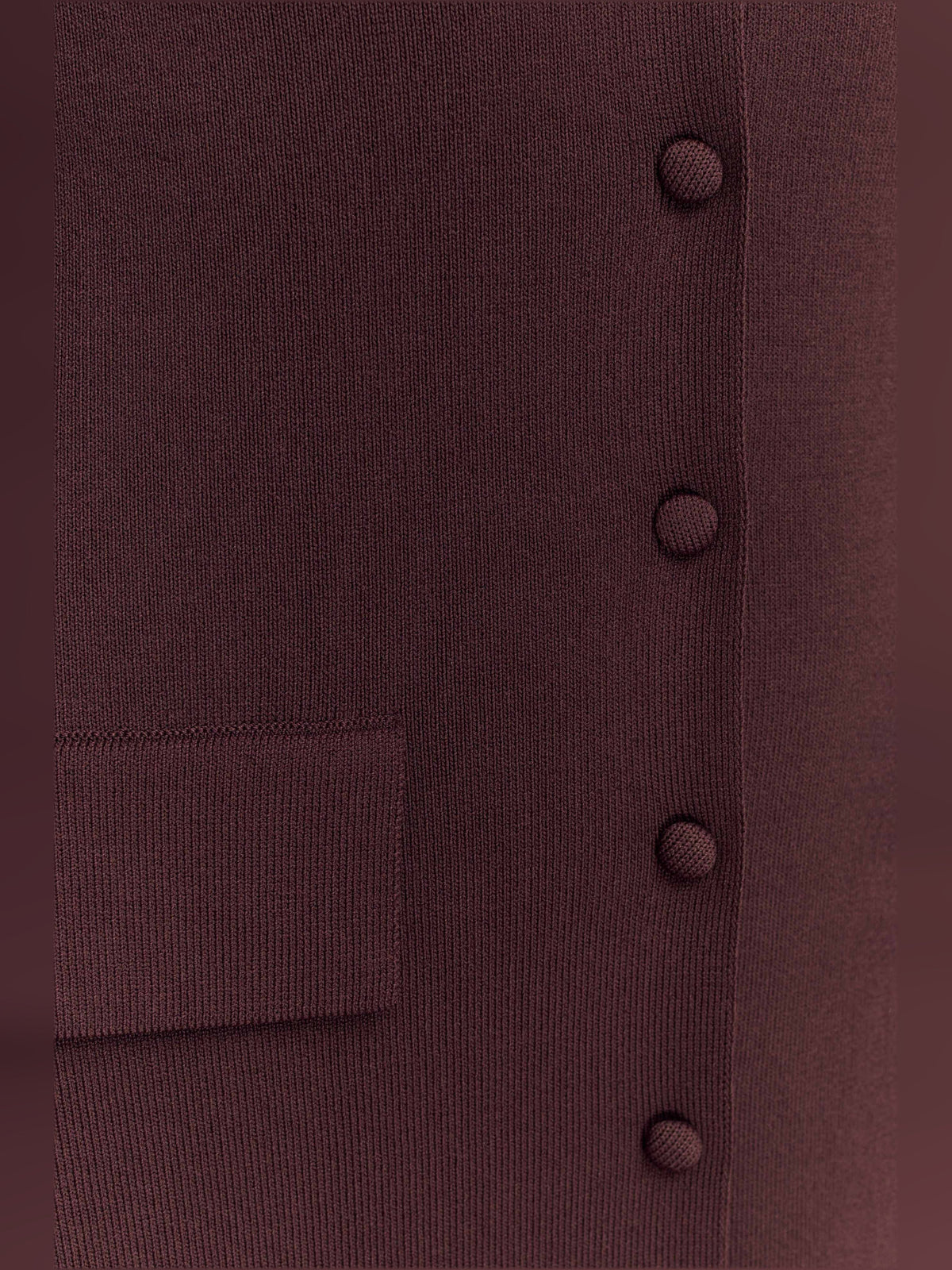 Chocolate-brown knit fabric with ribbed texture and visible button detail