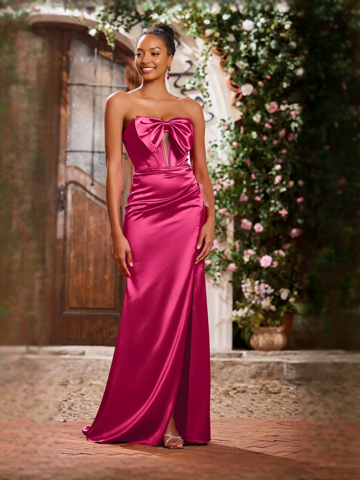Fuchsia strapless satin mermaid prom dress with ruched corset and bow neckline, side slit