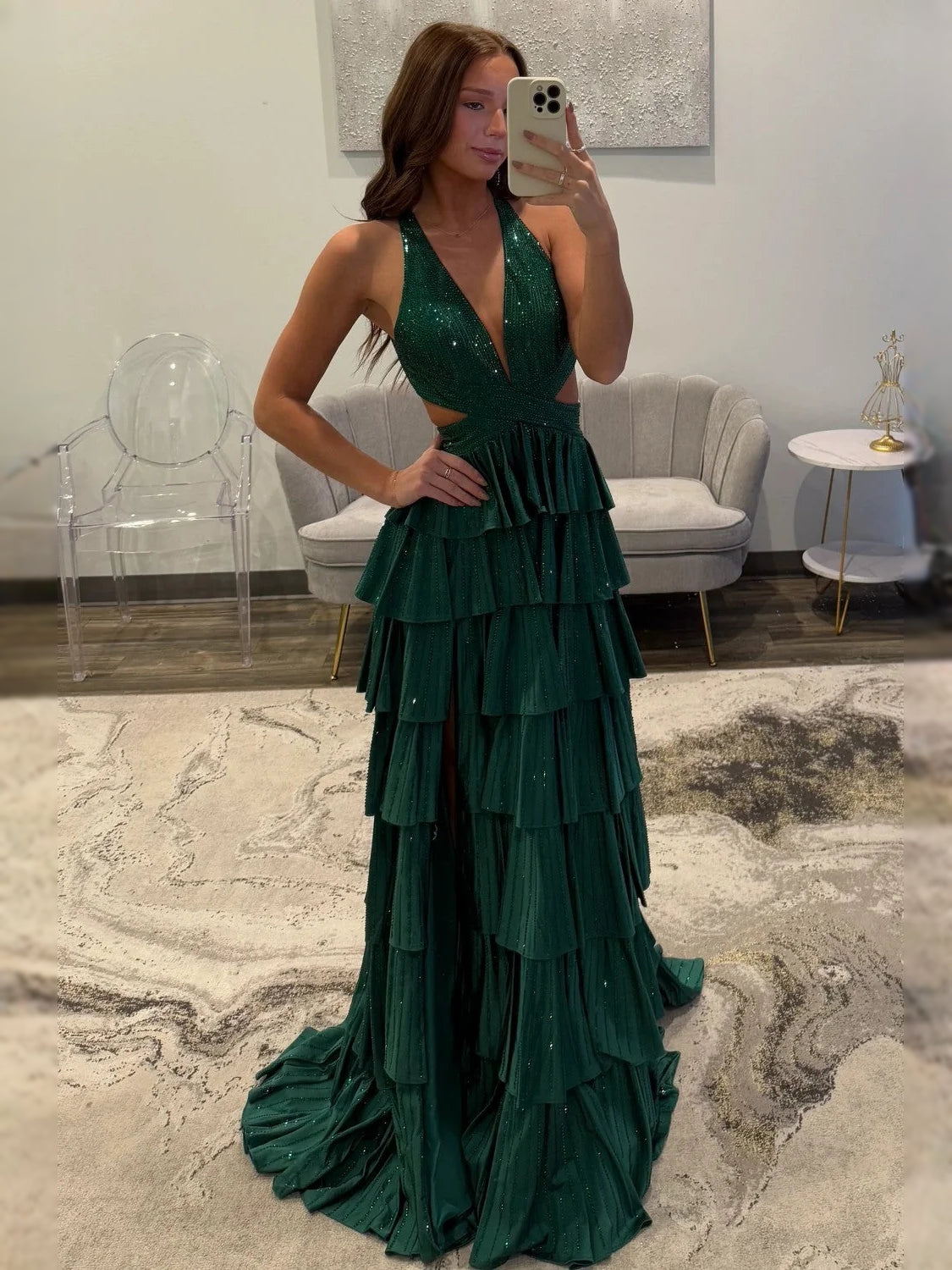 Emerald green V-neck tiered prom dress with beaded sparkle and floor-length skirt