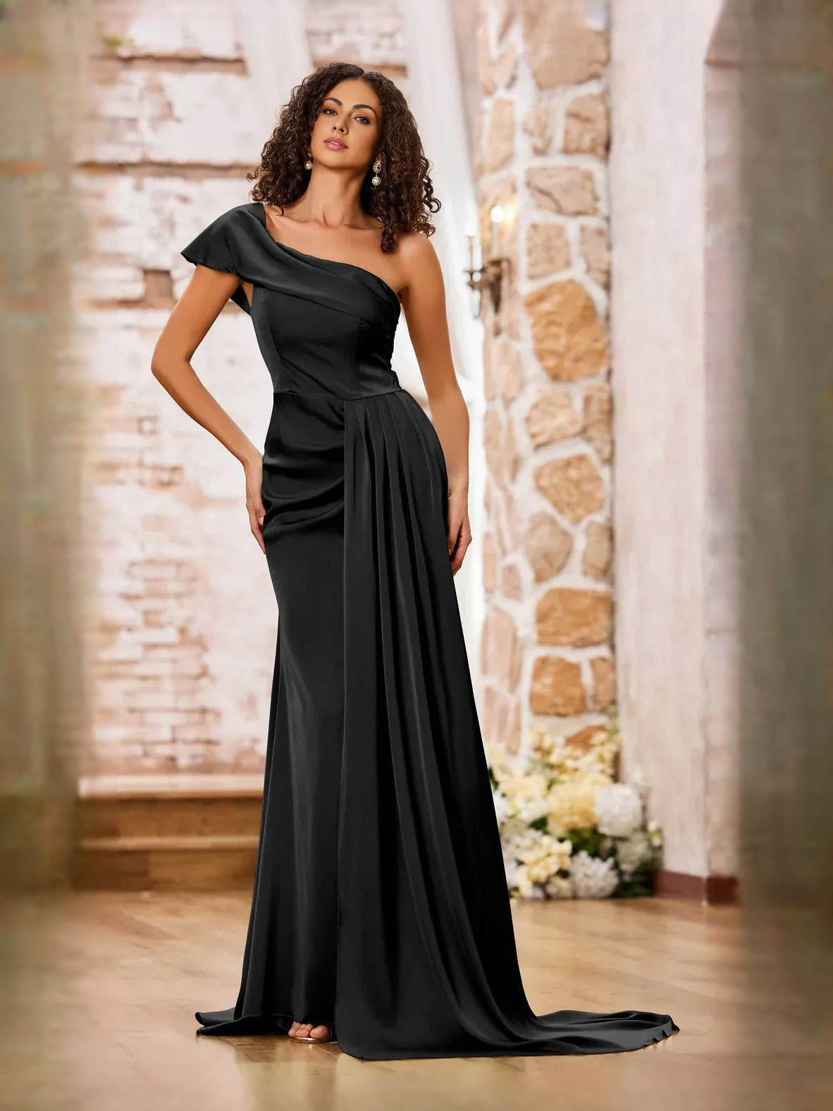 Black satin mermaid prom dress with asymmetrical neckline and draped floor-length skirt