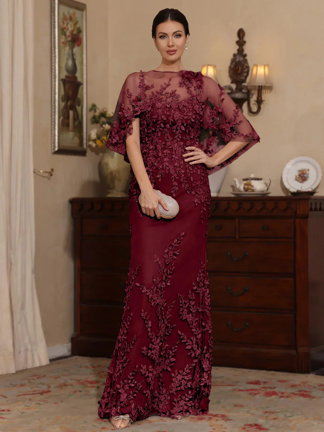 Burgundy sweetheart mermaid mother-of-the-bride dress with floral appliques and cape sleeves