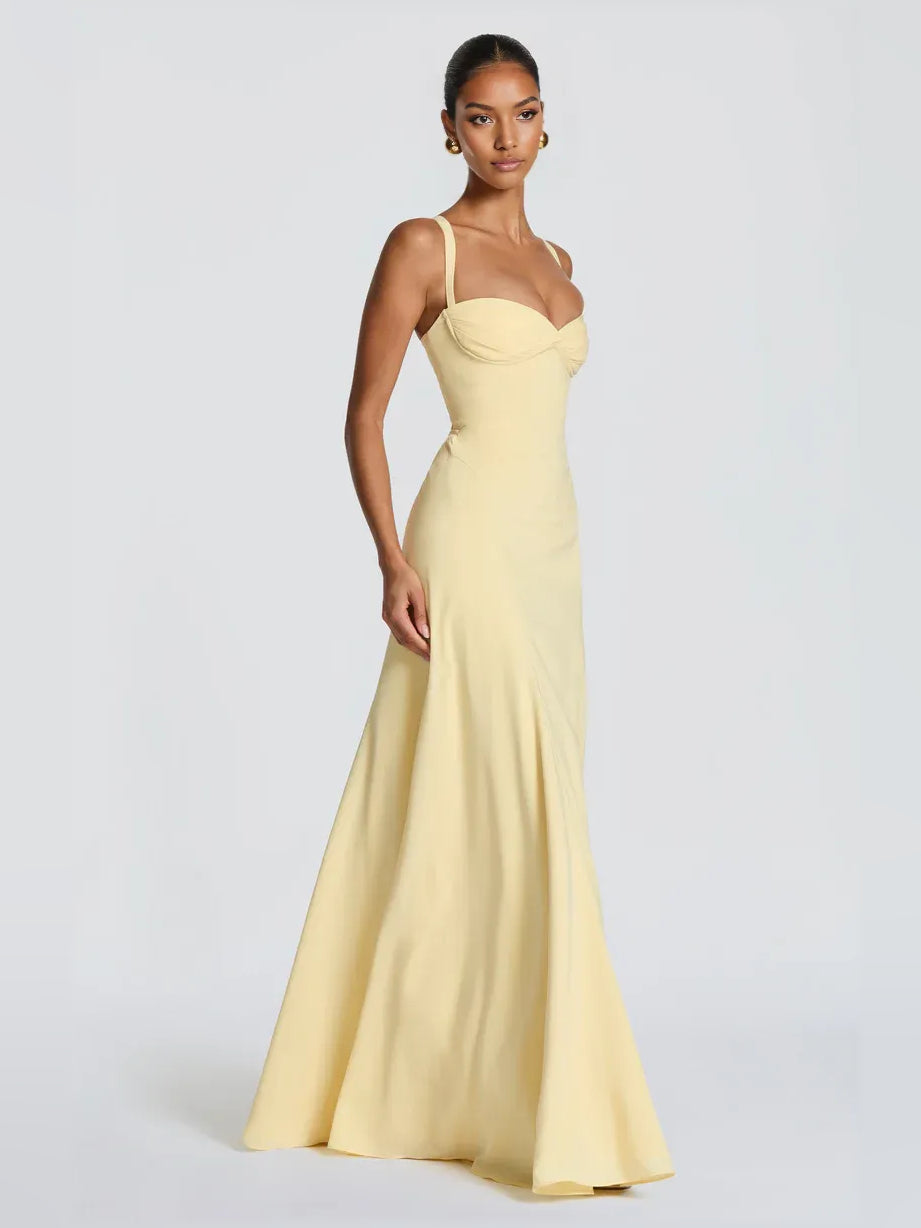 Lemon sweetheart corset A-line formal dress, side view, flowing floor-length skirt