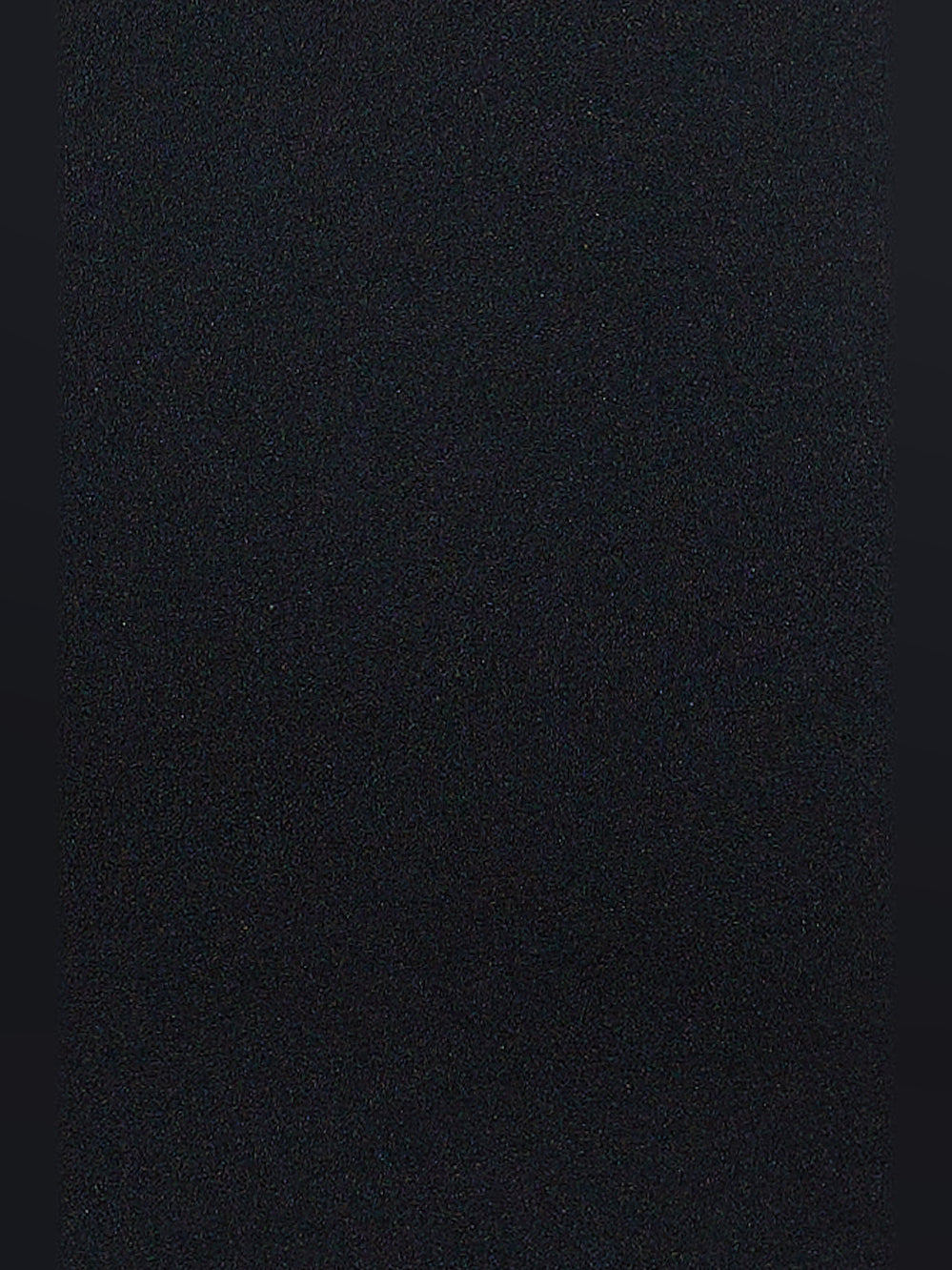 Black textured fabric close-up for a mini dress