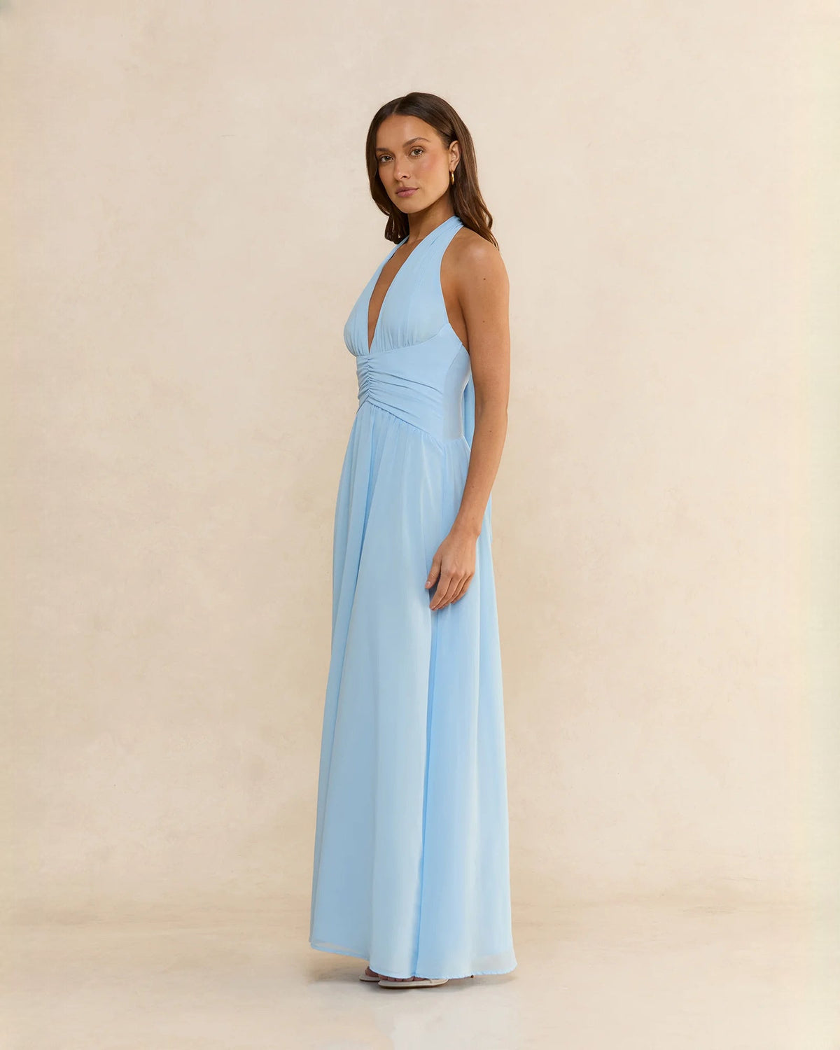 Light blue chiffon halter A-line maxi dress with gathered waist and soft pleated skirt