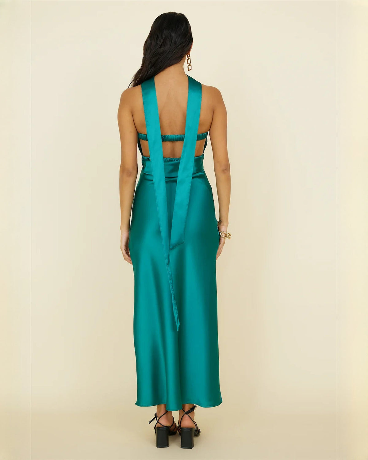 Teal satin long dress back view with vertical straps and open back cutout