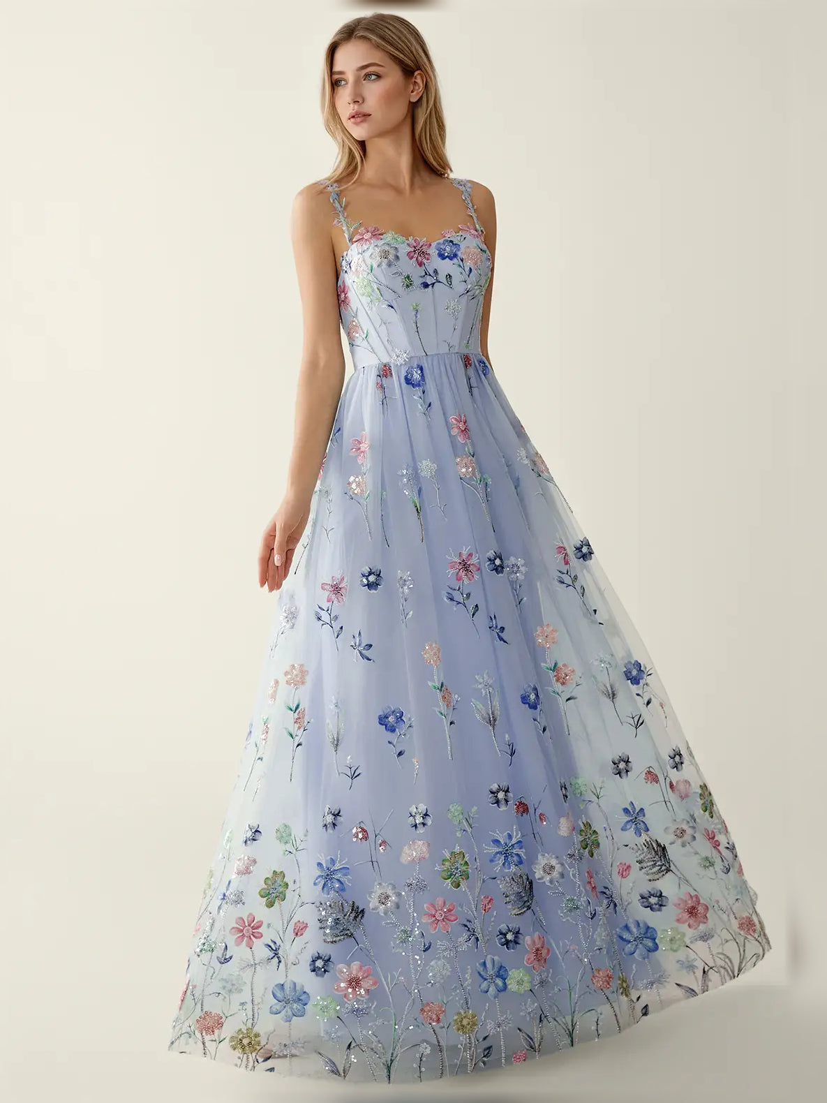 Light blue floral sequin fit-and-flare formal dress front view with thin straps