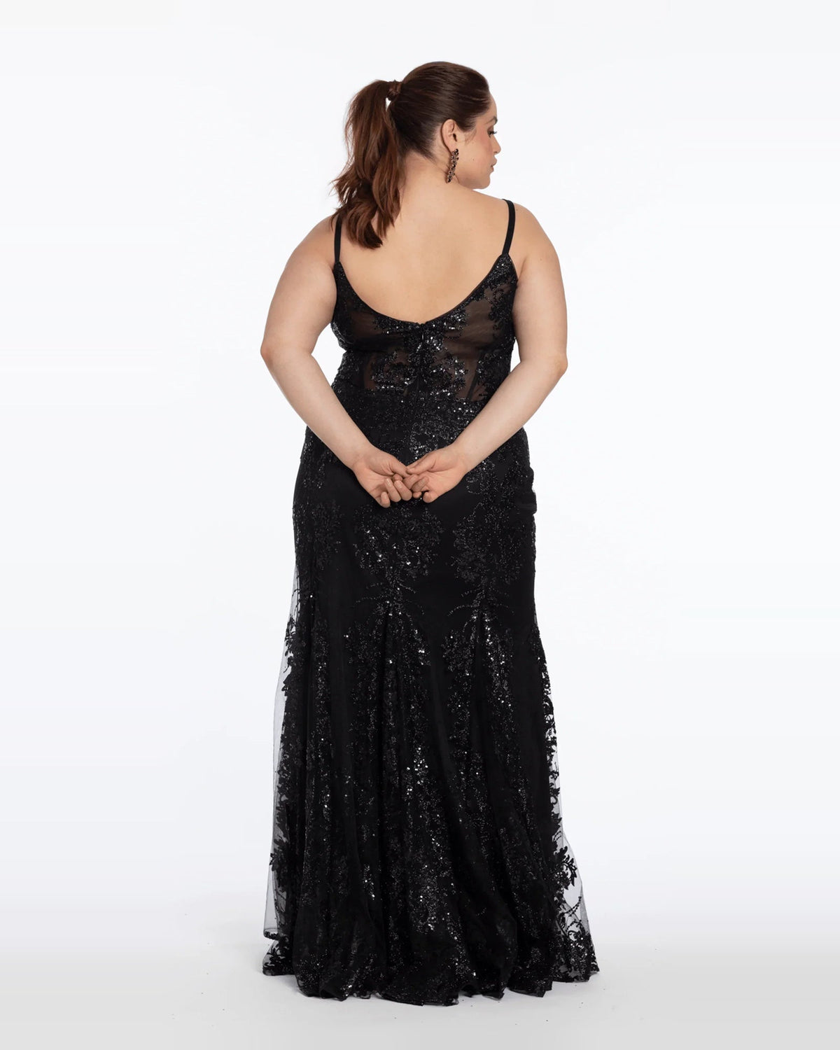 Black glitter mermaid prom dress with open back and spaghetti straps, full-length
