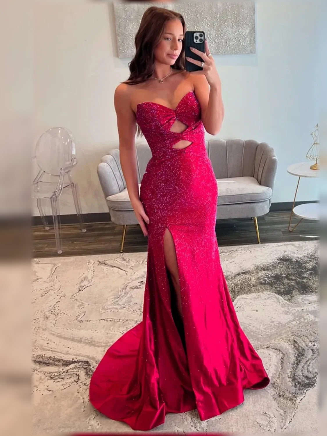 Red sequin sweetheart formal dress with cutout bodice and front slit