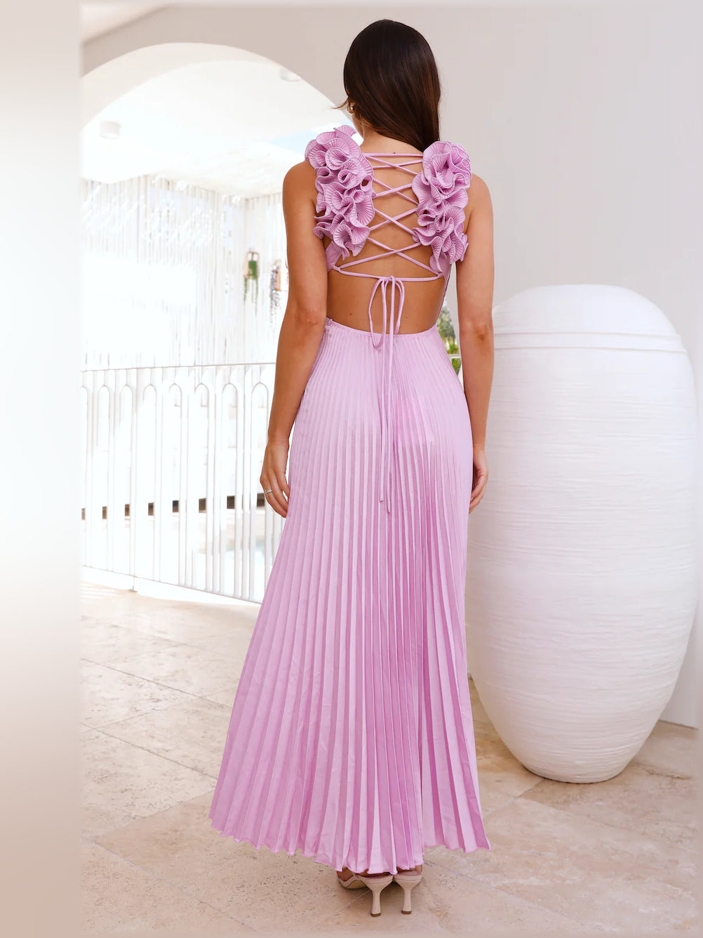 Lilac satin midi formal dress back view with floral ruffle shoulder accents