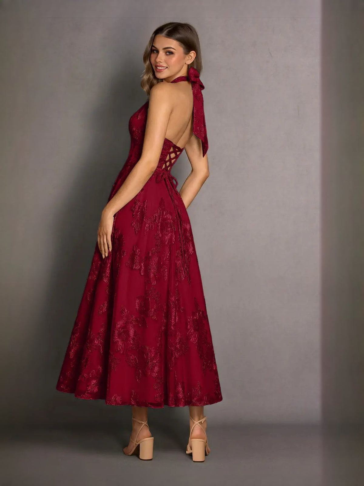 Burgundy halter neck A-line midi prom dress with ribbon neck tie and lace pattern