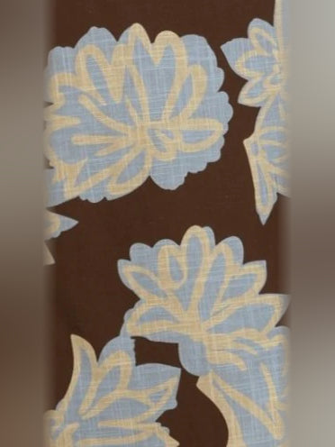 Brown fabric swatch with light blue and pale yellow floral print