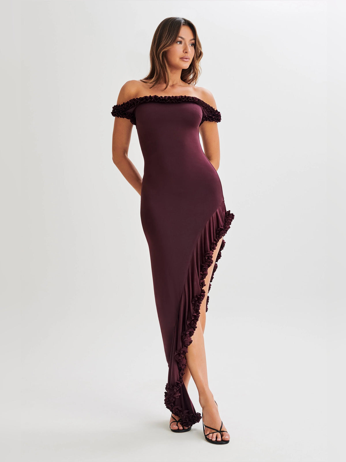 Plum off-shoulder ruffle midi dress with fitted bodice and side slit detail