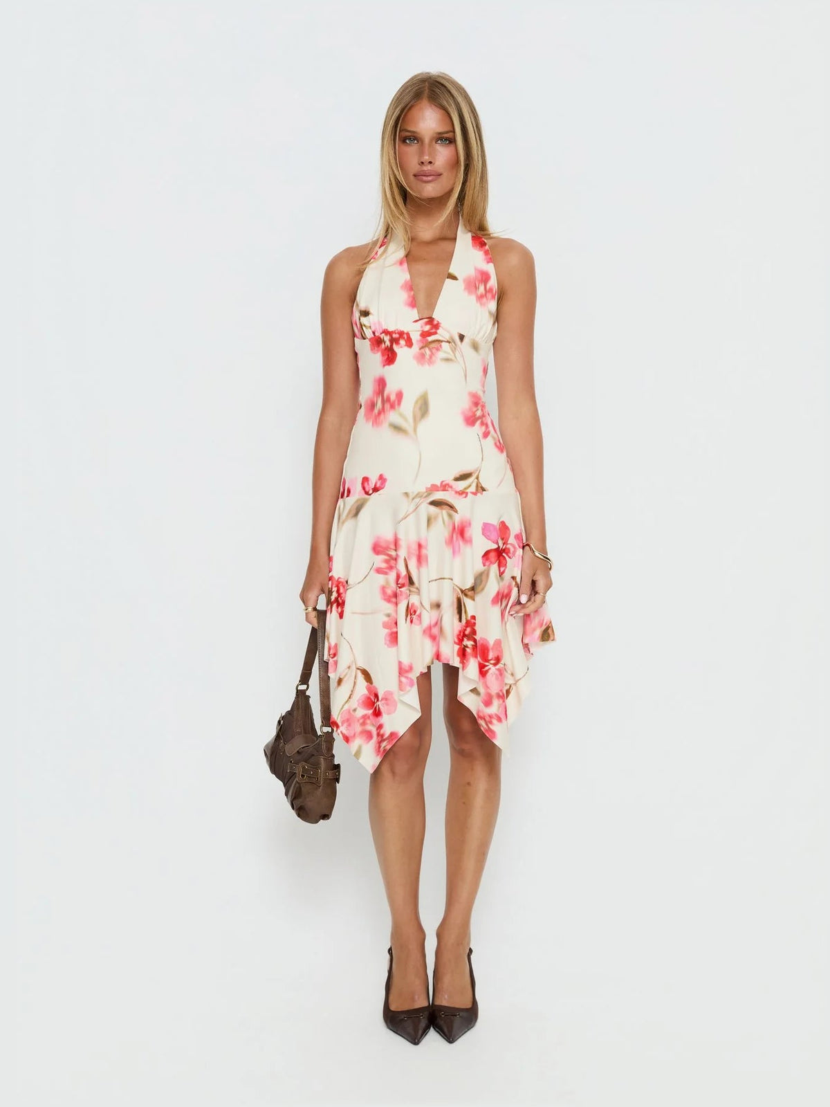 Cream floral halter asymmetrical midi dress with knotted neck and ruffle hem