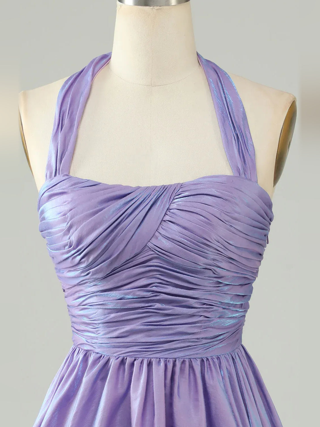 Close-up of lavender ruched halter mini dress neckline and ruched sweetheart bodice