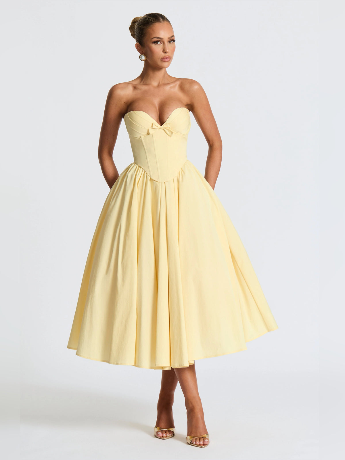 Lemon yellow strapless sweetheart midi formal dress with pleated skirt and waist bow
