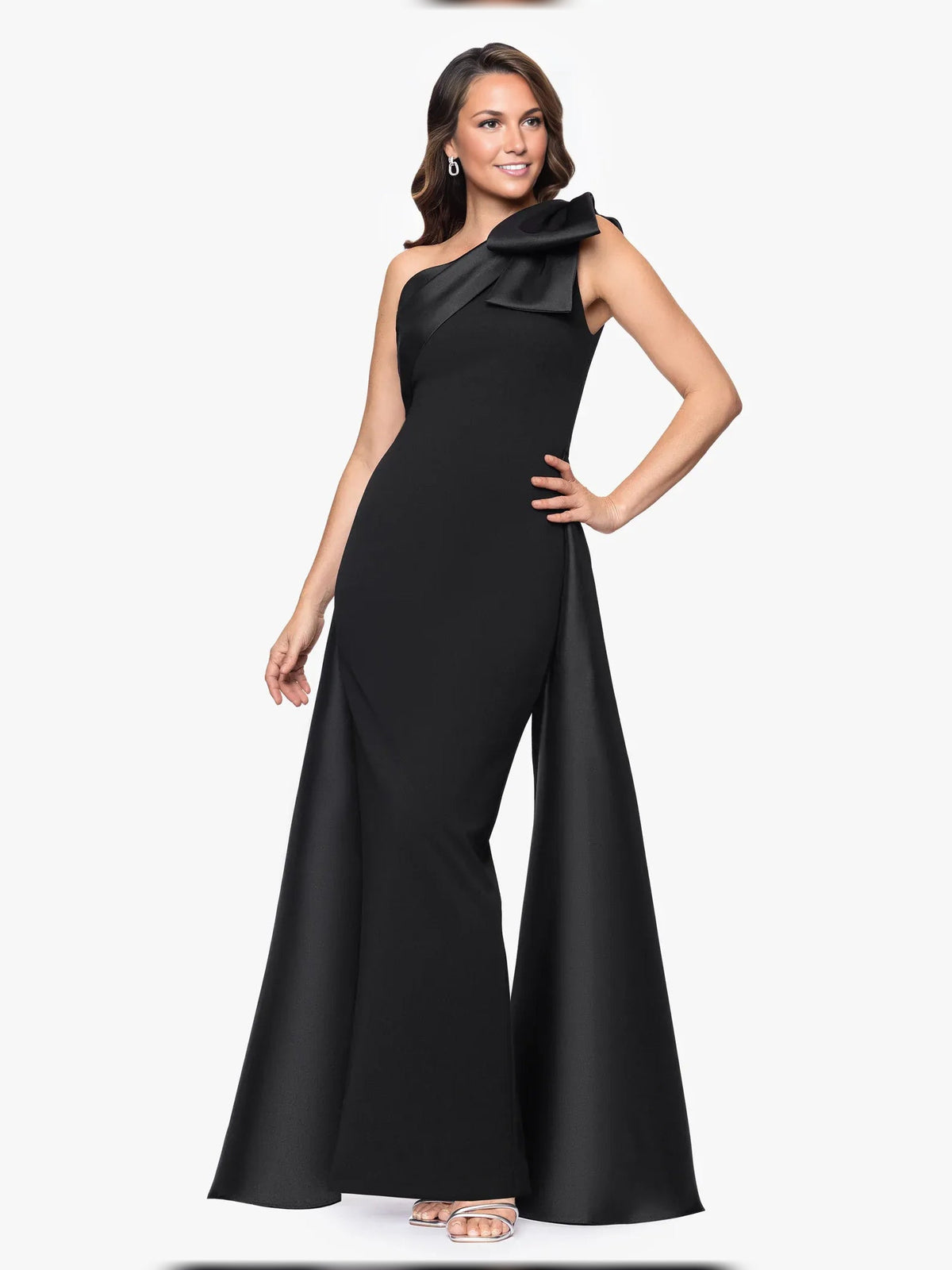 Black one-shoulder sheath dress with bow shoulder detail and wide floor-length skirt