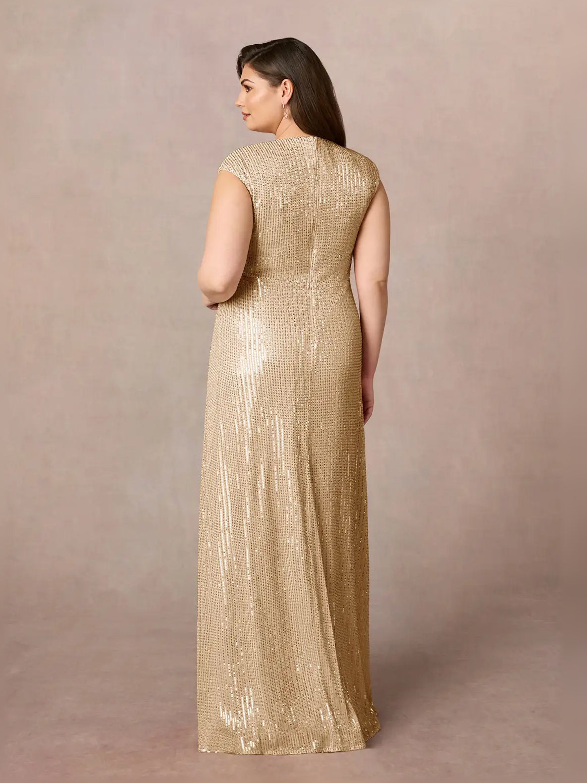 Back view of champagne sequin formal dress with V-neck and sleeveless cut, floor-length