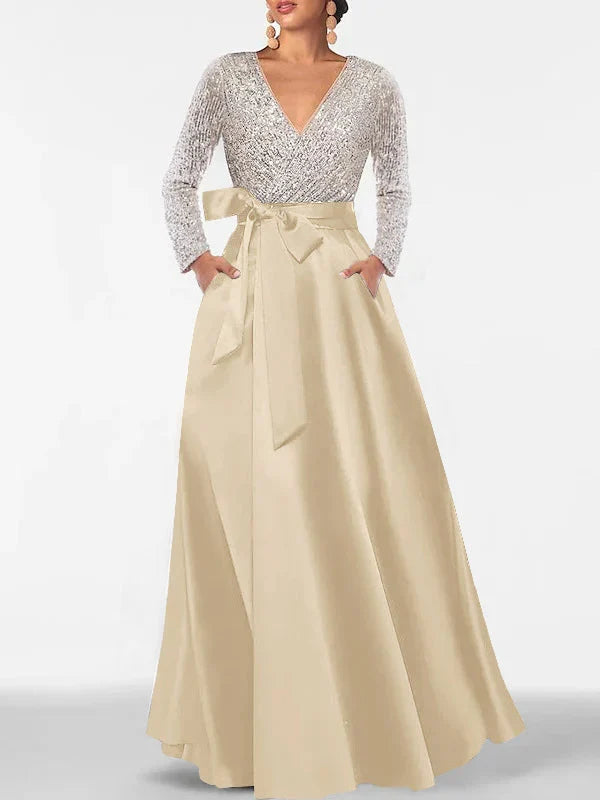 V-neck formal dress with silver sequin top and champagne satin full-length skirt