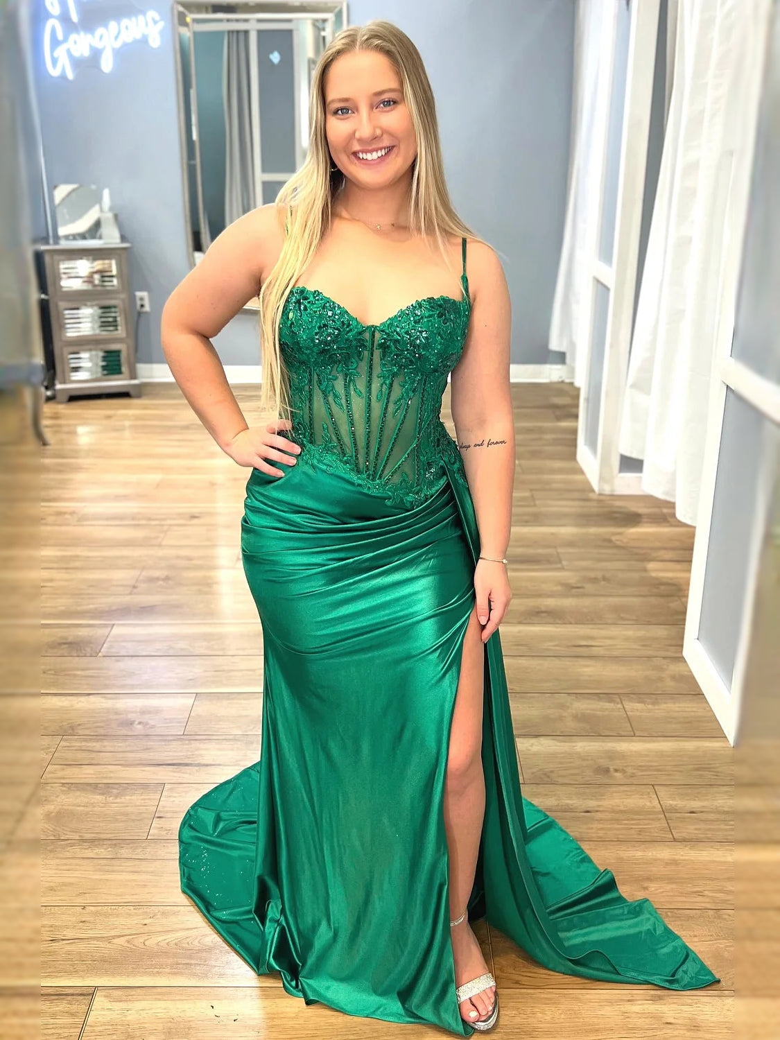 Emerald green beaded corset mermaid prom dress with spaghetti straps and front slit