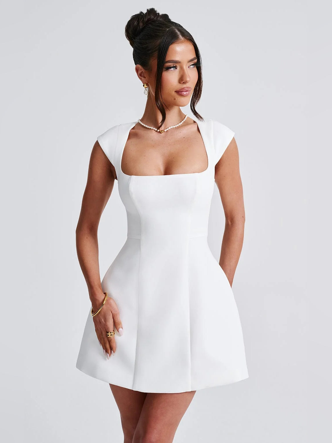 Ivory square-neck A-line mini dress with cap sleeves and side silhouette