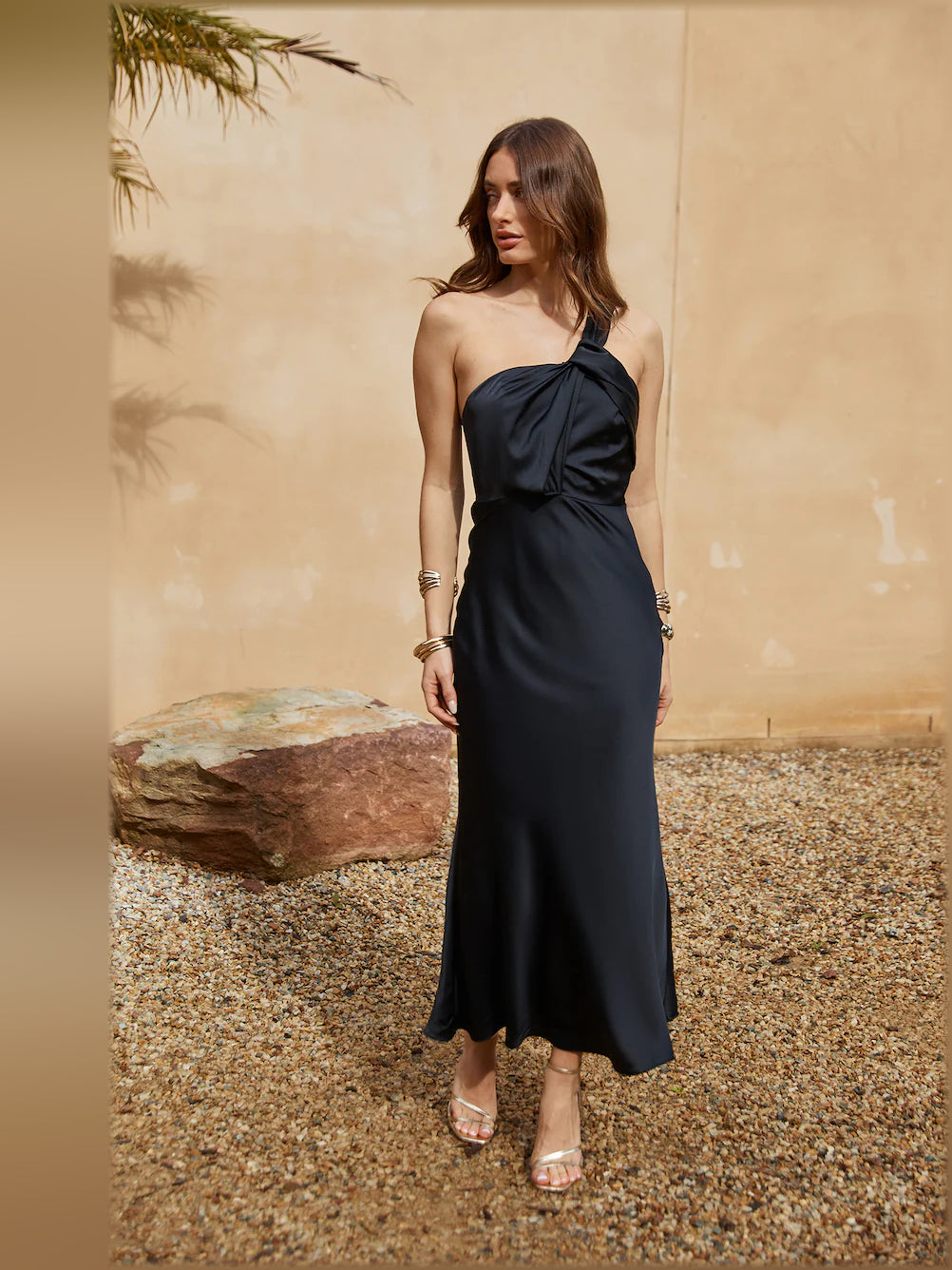 Black satin midi dress with halter neckline and gathered front detail