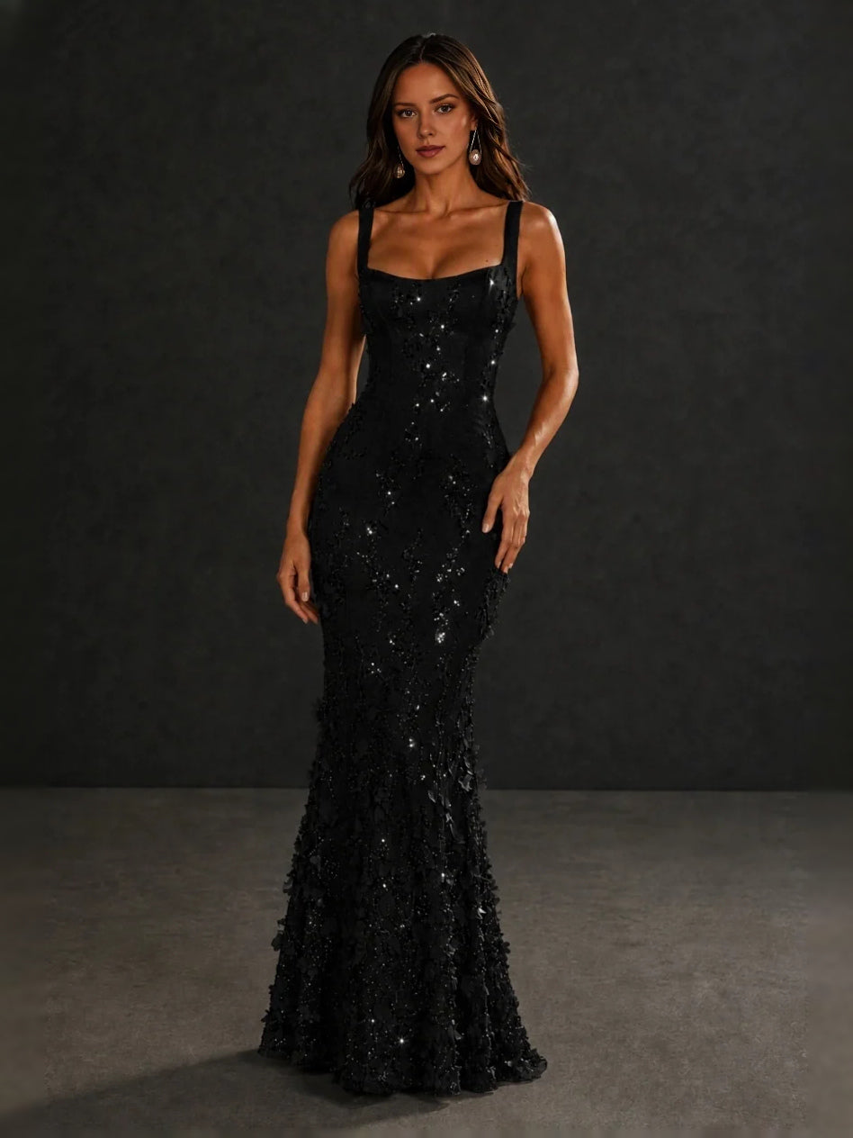 Black corset-style mermaid prom dress with square neckline and floral sparkle appliques