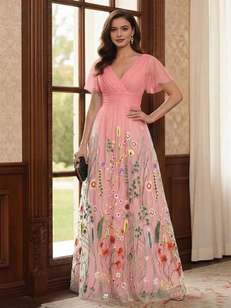 Pink V-neck A-line tulle dress with ruched waist, short sleeves, and floral embroidery