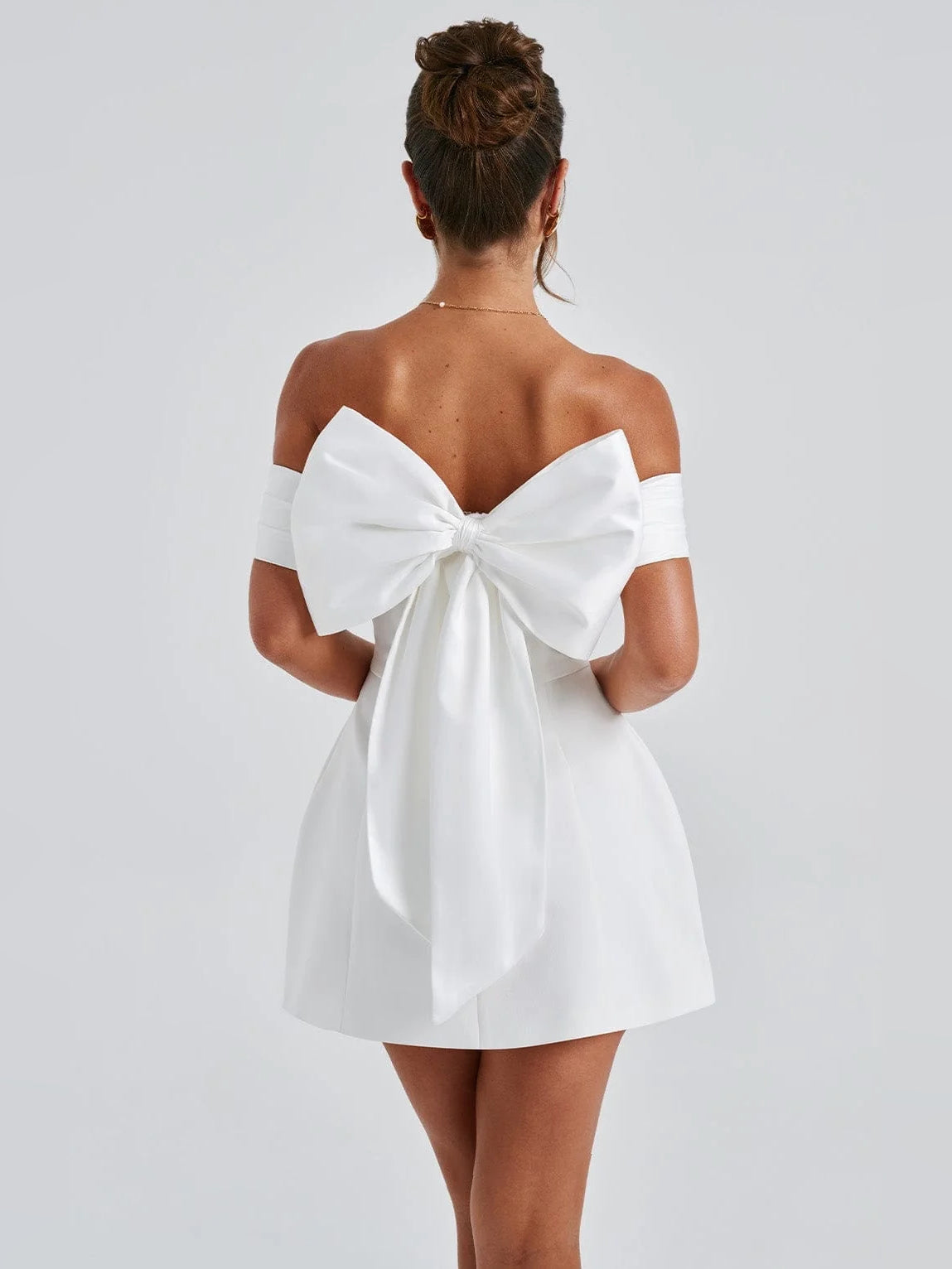 White off-shoulder A-line mini satin dress with back bow and off-shoulder neckline