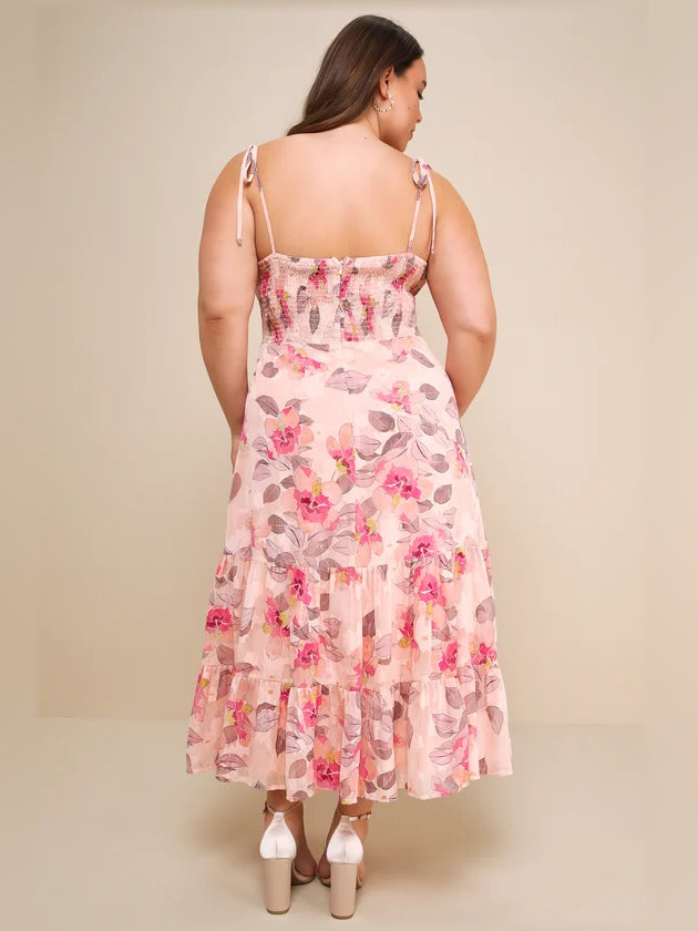 Pink floral tiered midi dress back view with tie shoulder straps and tiered skirt