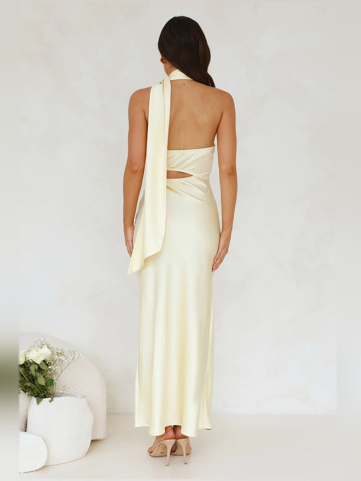Cream satin midi dress with open back and halter strap