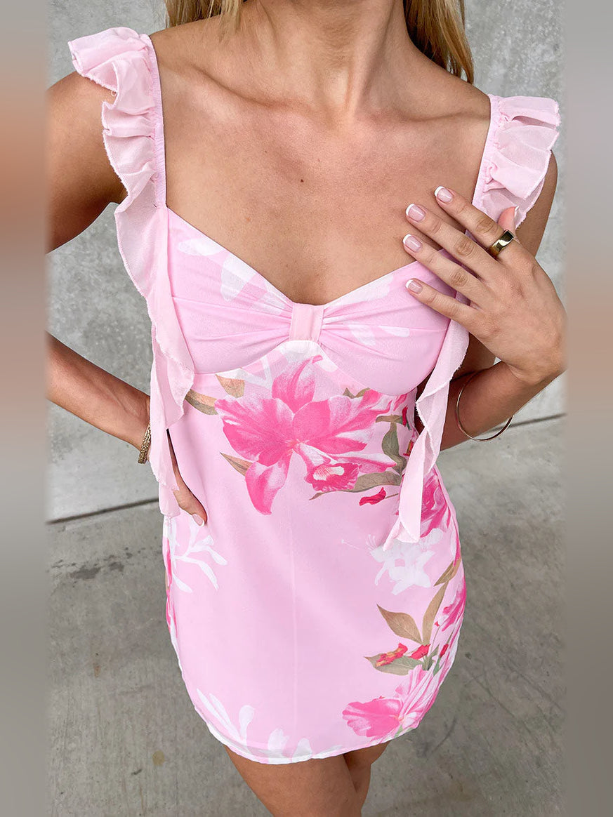 Close-up: pink floral mini chiffon dress with square neckline and ruffled straps