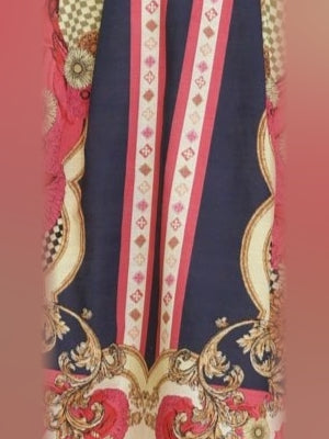 Close-up of pink, navy, and gold printed mini dress panel with ornate details