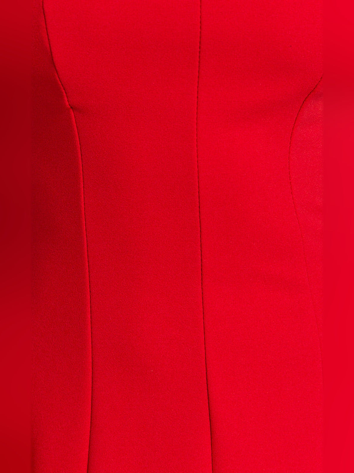 Red dress bodice close-up showing vertical seams and fitted panel