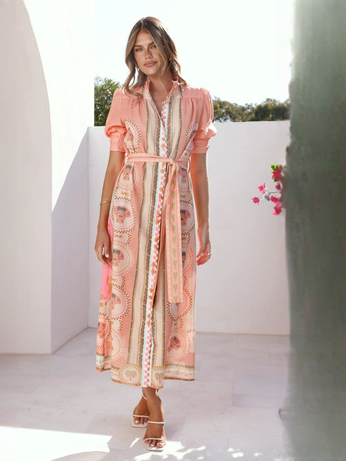 Peach midi formal dress with medallion print, tie waist, and soft ruffle neckline