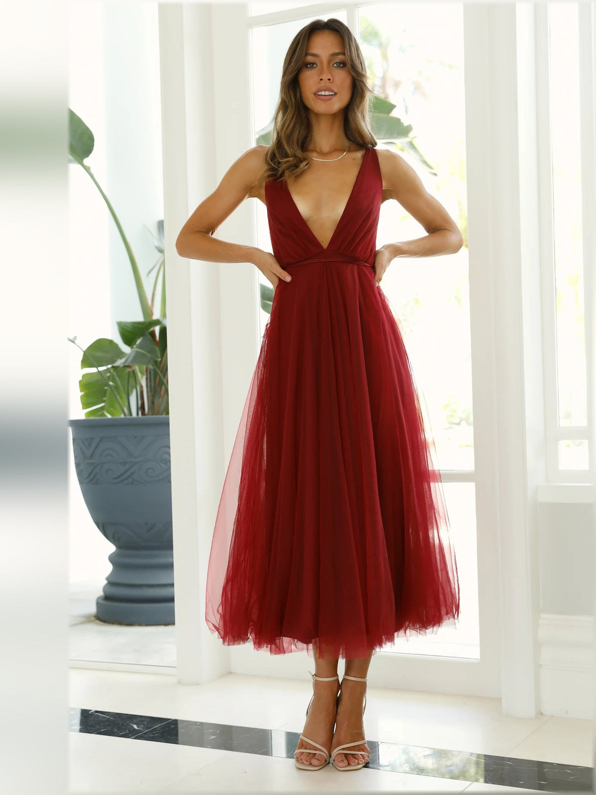 Wine red halter midi dress with fitted waist and layered tulle skirt
