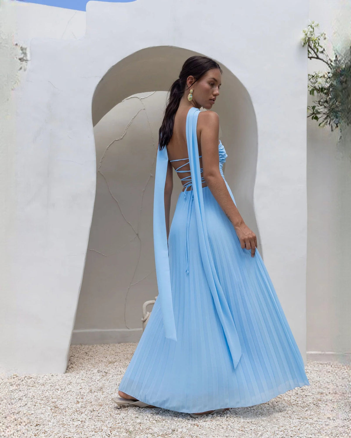 Blue strapless chiffon maxi A-line dress with open back crisscross detail