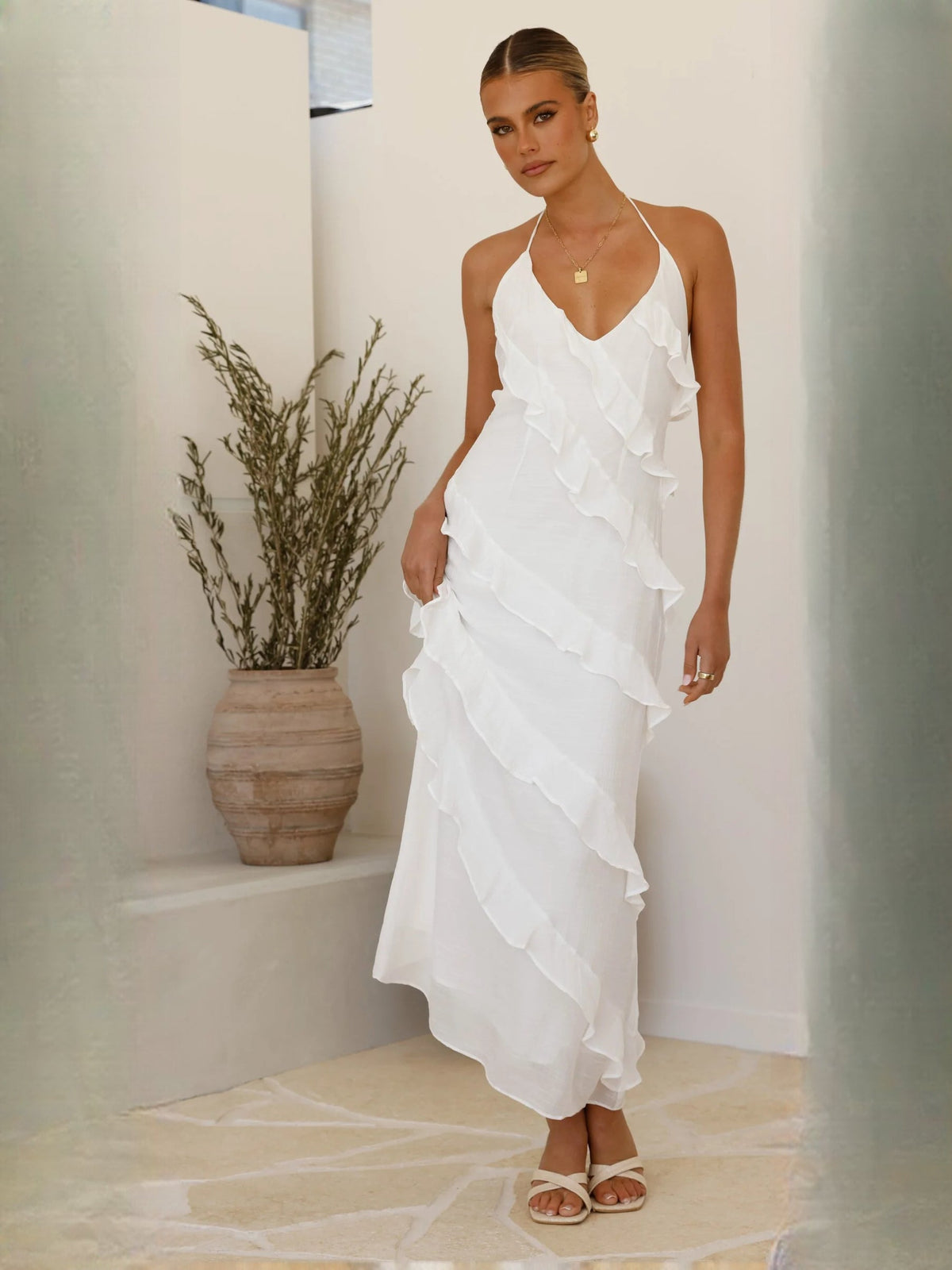 White sheath maxi formal dress with cutout detail, alternate full-length view showing the overall silhouette