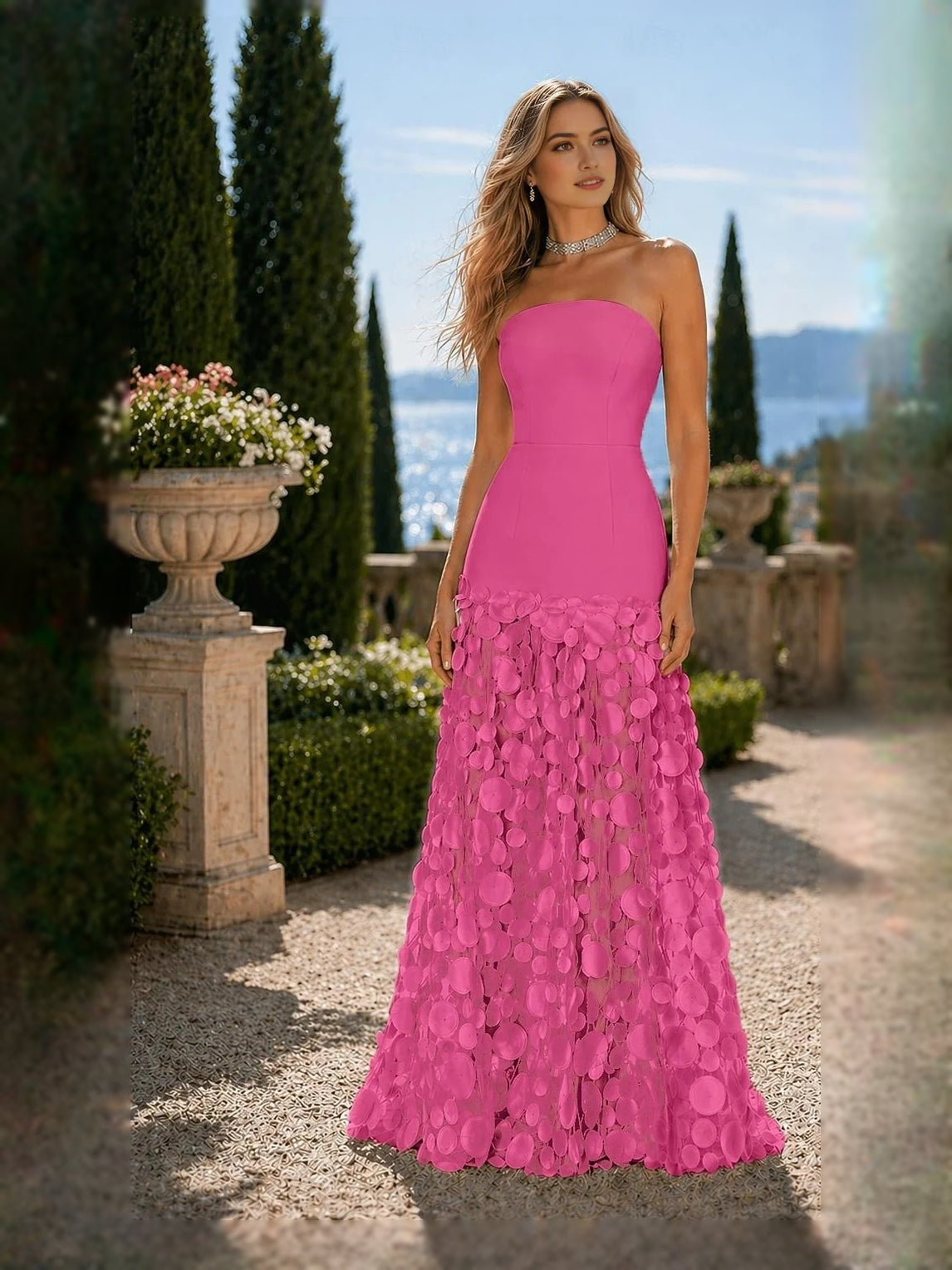 Strapless mermaid prom dress with hot pink strapless bodice and layered tulle skirt