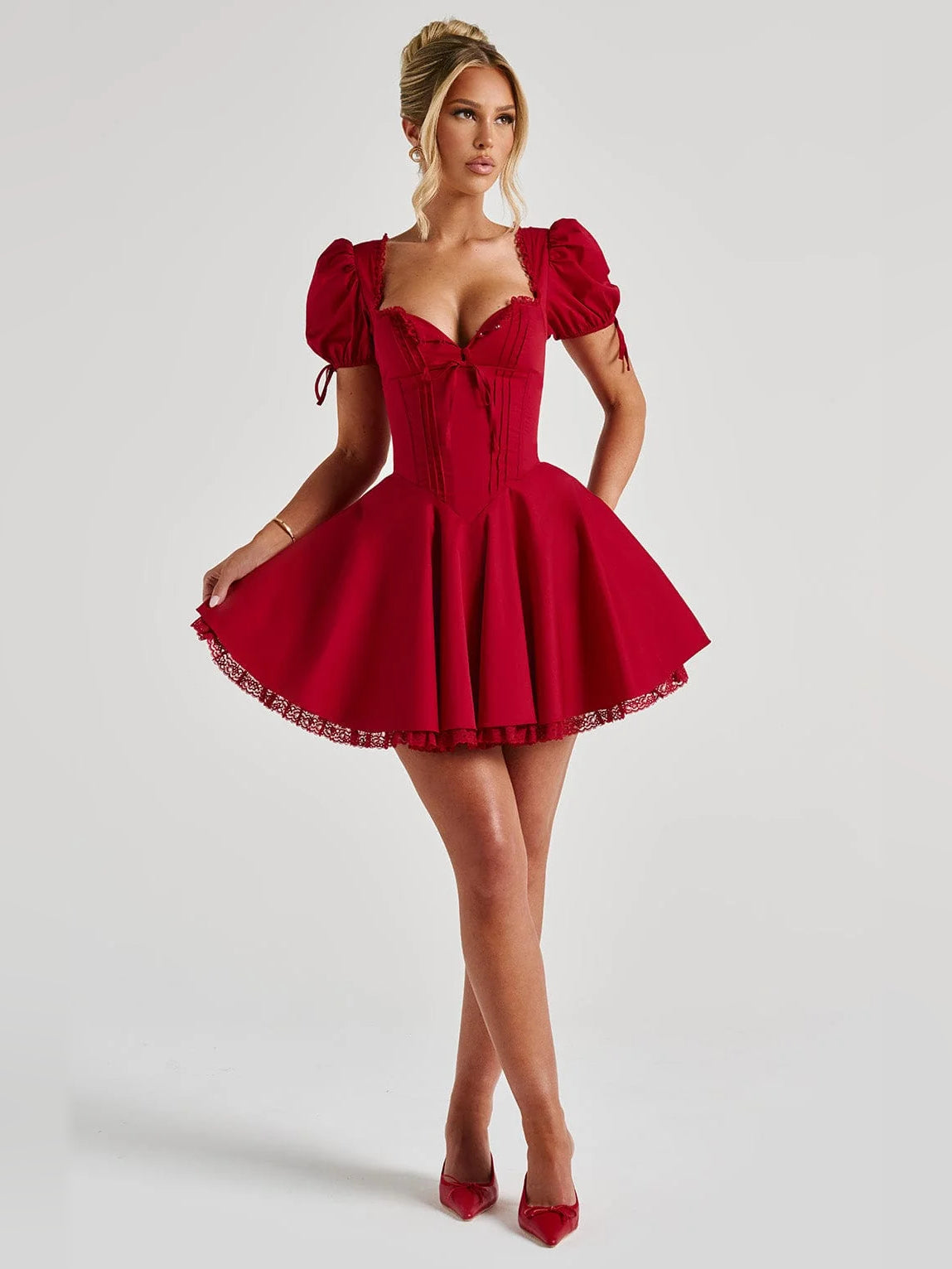 Red mini dress with square neckline, puff sleeves, corset bodice, short flared skirt