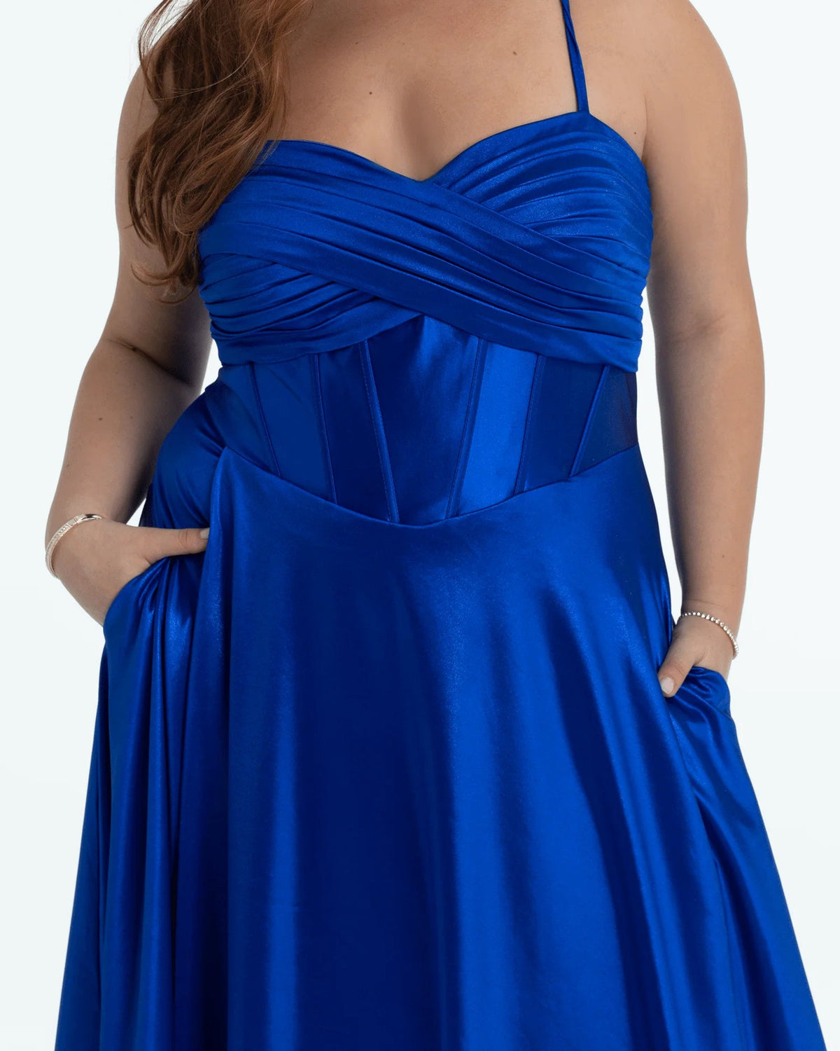 Close-up of blue corset bodice with sweetheart wrap styling and fitted waist