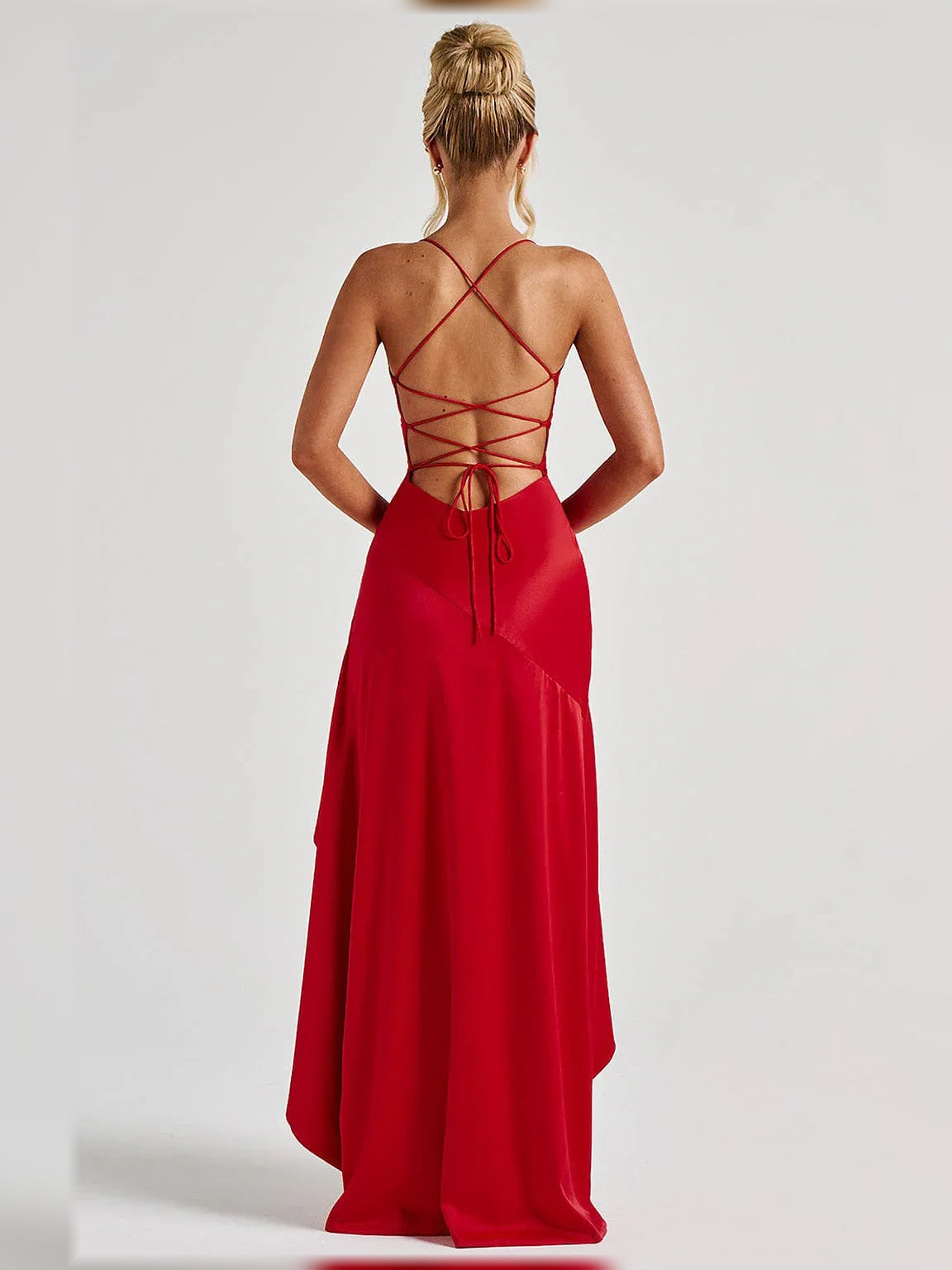 Red cowl neck sheath formal dress with open back crisscross straps and flowing floor length
