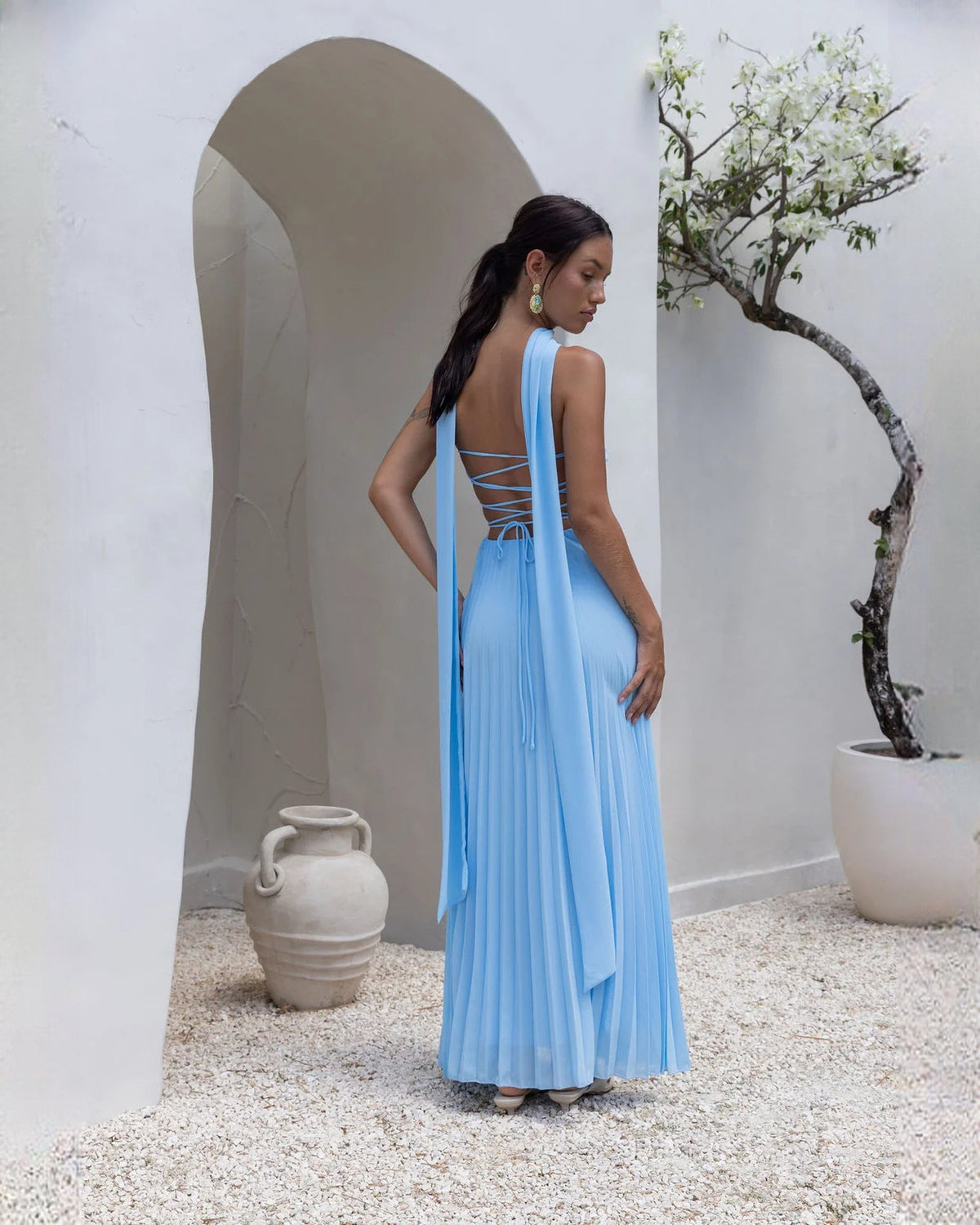Blue strapless chiffon maxi A-line dress with lace-up open back and pleated skirt