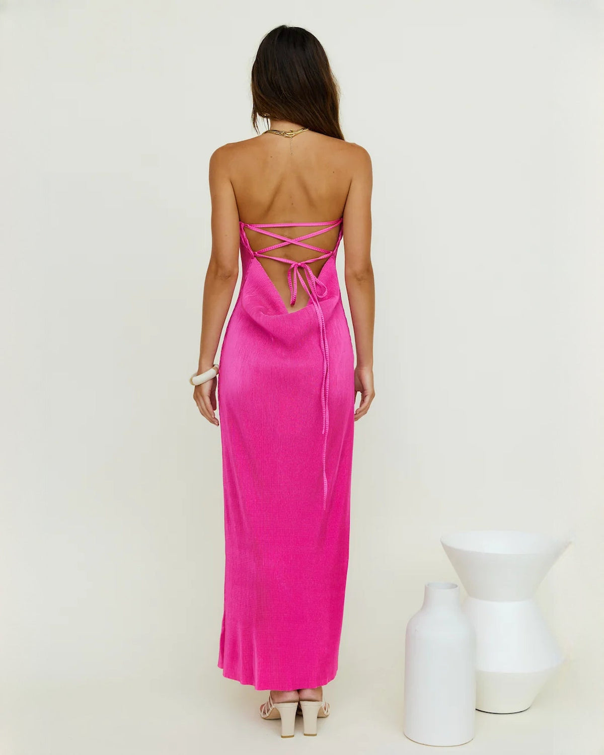 Pink satin A-line maxi bridesmaid dress with crisscross back straps