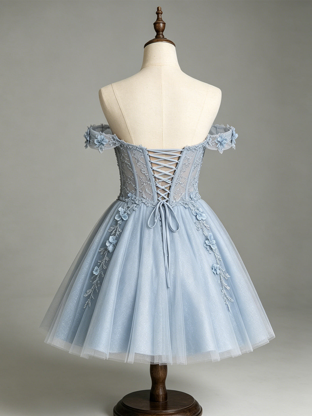 Light blue off-shoulder corset tulle dress back with crisscross lacing and floral details