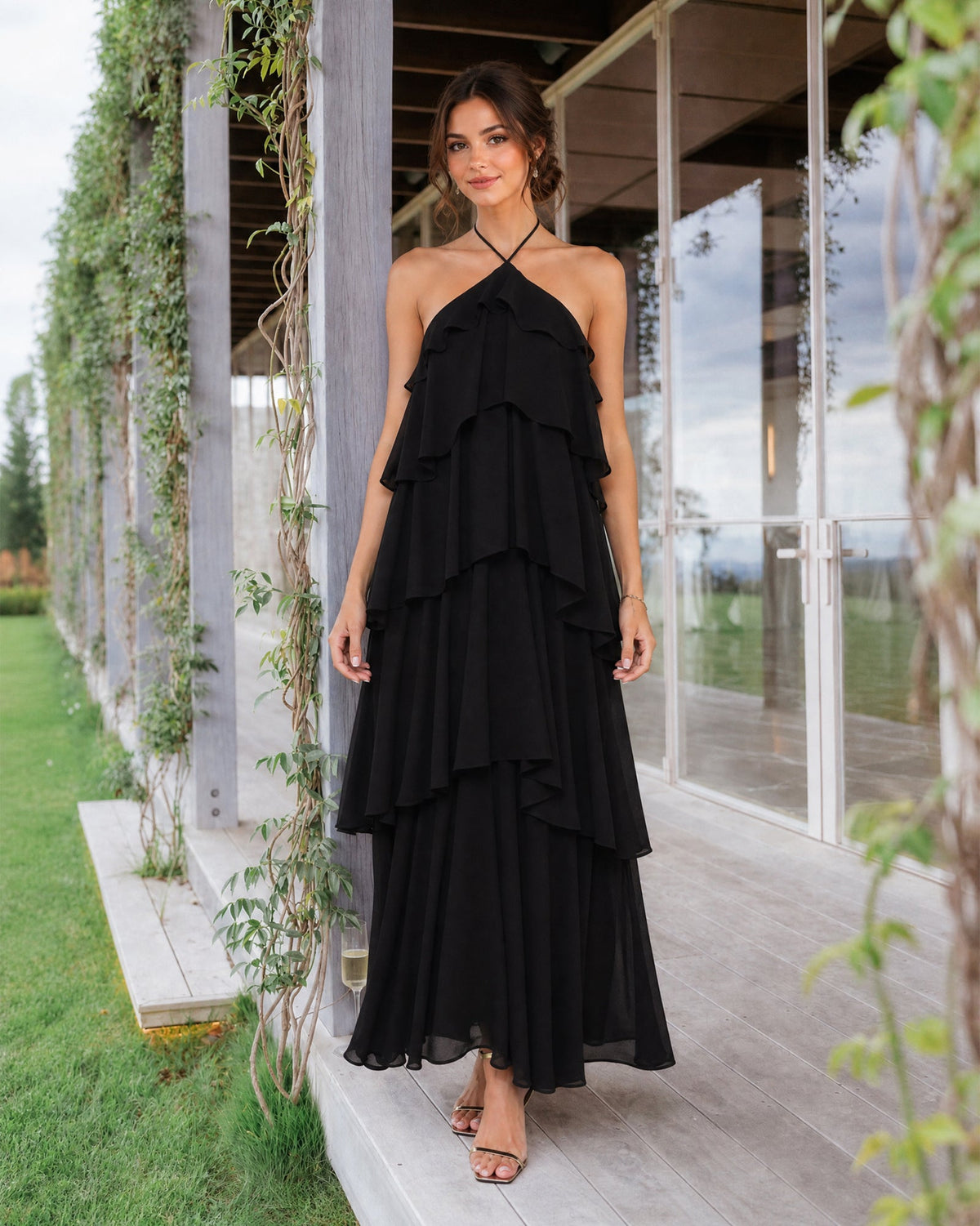 Black halter neck tiered chiffon bridesmaid dress with layered ruffle overlay