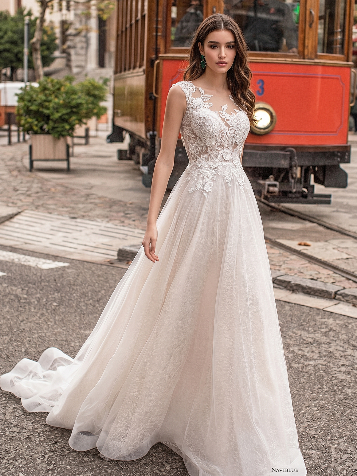 V-neck lace tulle A-line wedding dress with spaghetti straps - image 1