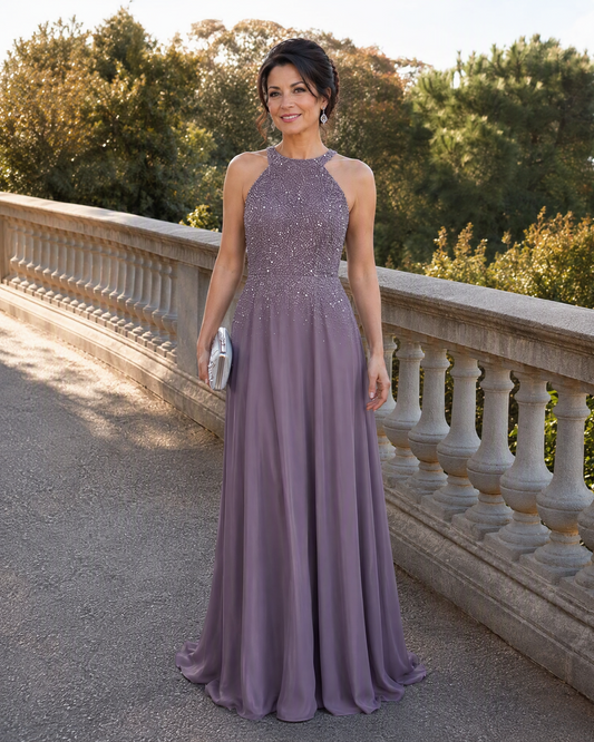 Lilac halter-neck mother of the bride dress with sparkling sequin bodice and A-line chiffon skirt