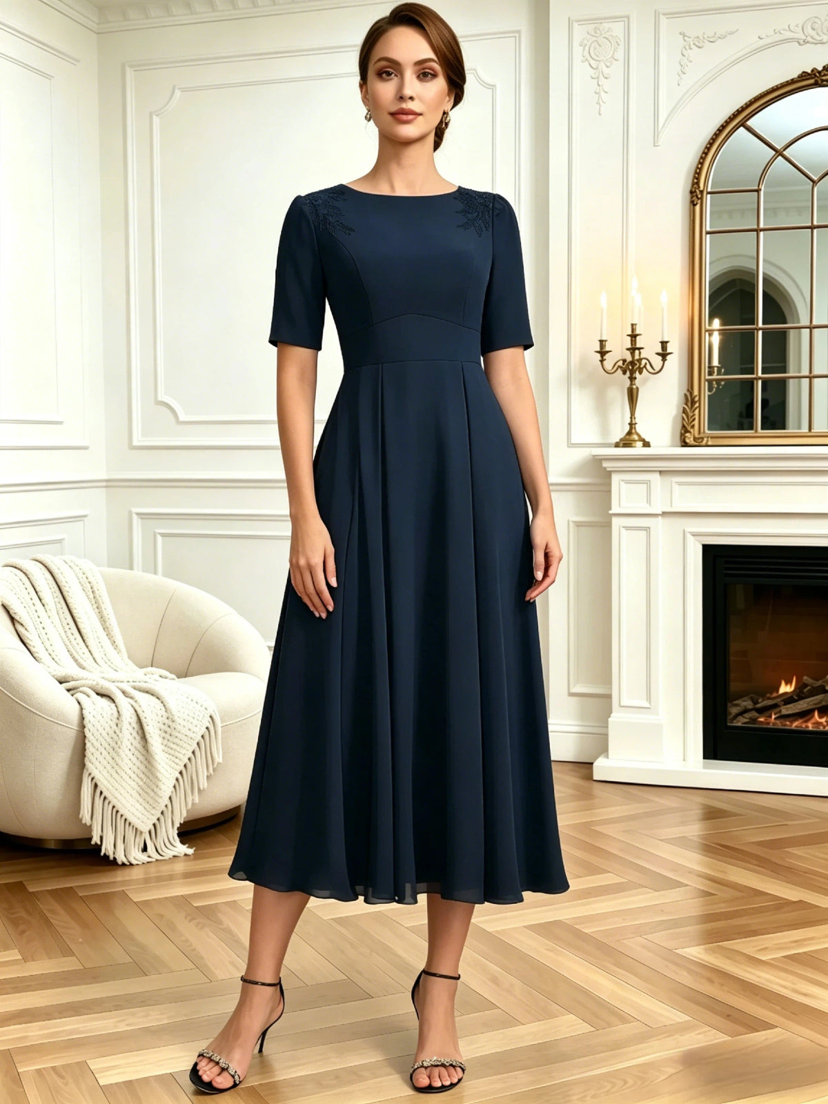 tea length mother of the bride dress with jewel neckline, short sleeves, A-line skirt, and shoulder embroidery