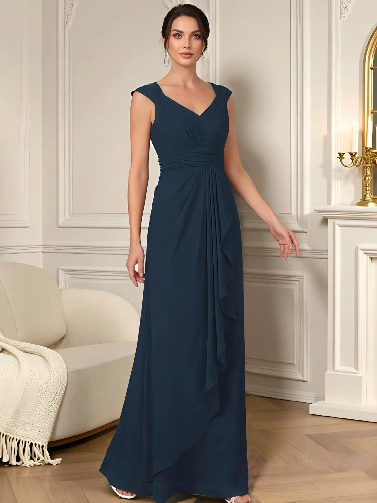 long sleeveless V-neck chiffon mother of the bride gown with pleated bodice and cascading ruffle detail full length product view for ceremony and reception occasions