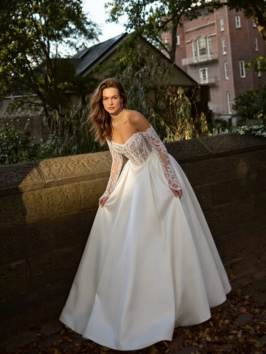 off shoulder lace ball gown wedding dress with long sleeve bodice - image 2